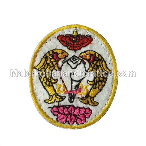 Yellow And White Bhutan Army Uniform Badge