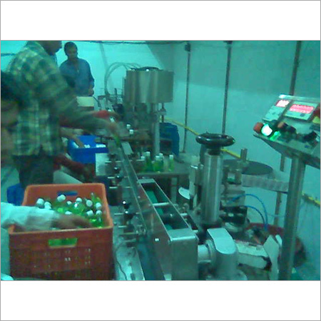 Complete Automatic Bottle Filling Machine