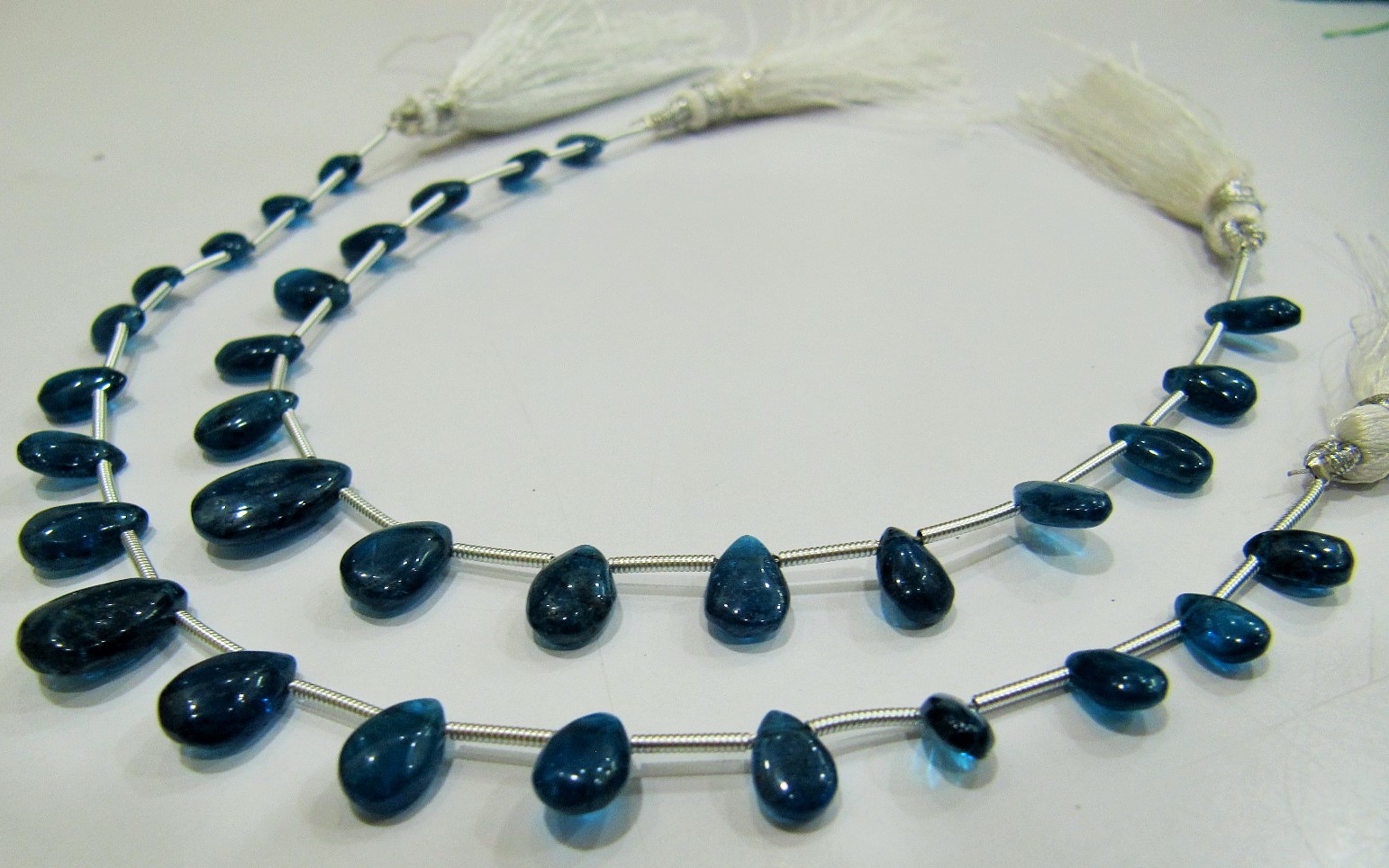 Aaa Quality Natural Neon Apatite Briolette Beads - 4x6mm To 5x7mm, Blue Pear Shape Plain Smooth Strand 8 Inches Long