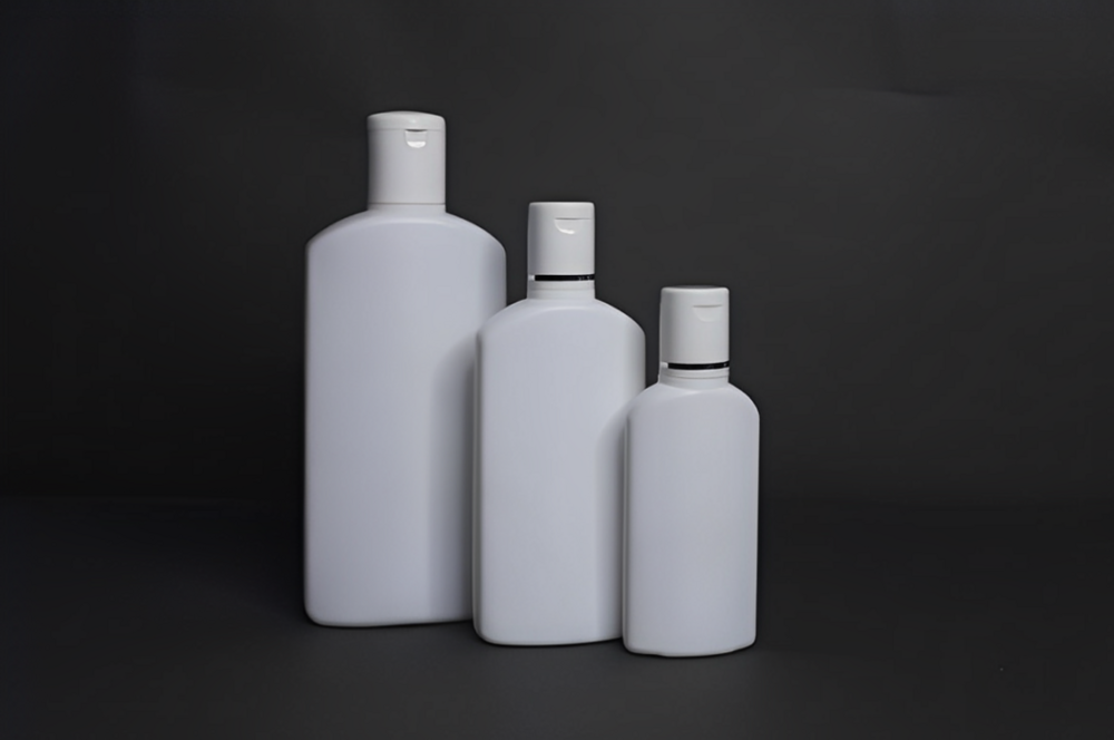 फ्लिप टॉप कैप क्षमता के साथ गोल बोतल: 50-100 - 200 मिलीलीटर (एमएल)