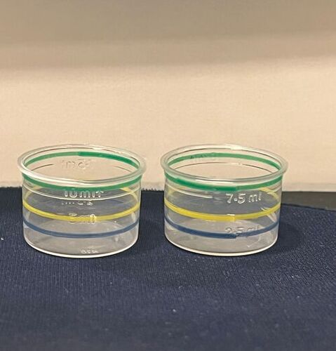 पारदर्शी दवा मापने का कप