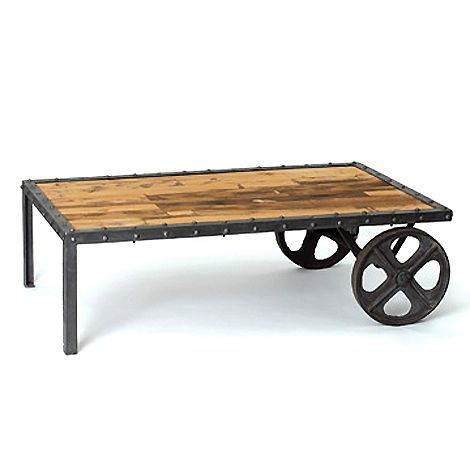 Smooth Cofee Table With Cast Iron Wheels
