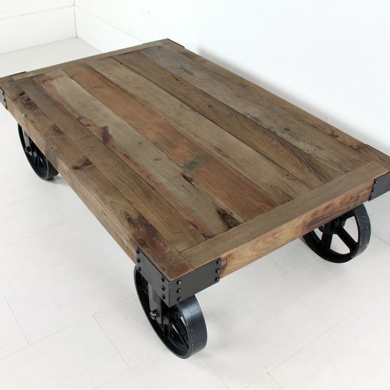 Smooth Cofee Table With Cast Iron Wheels