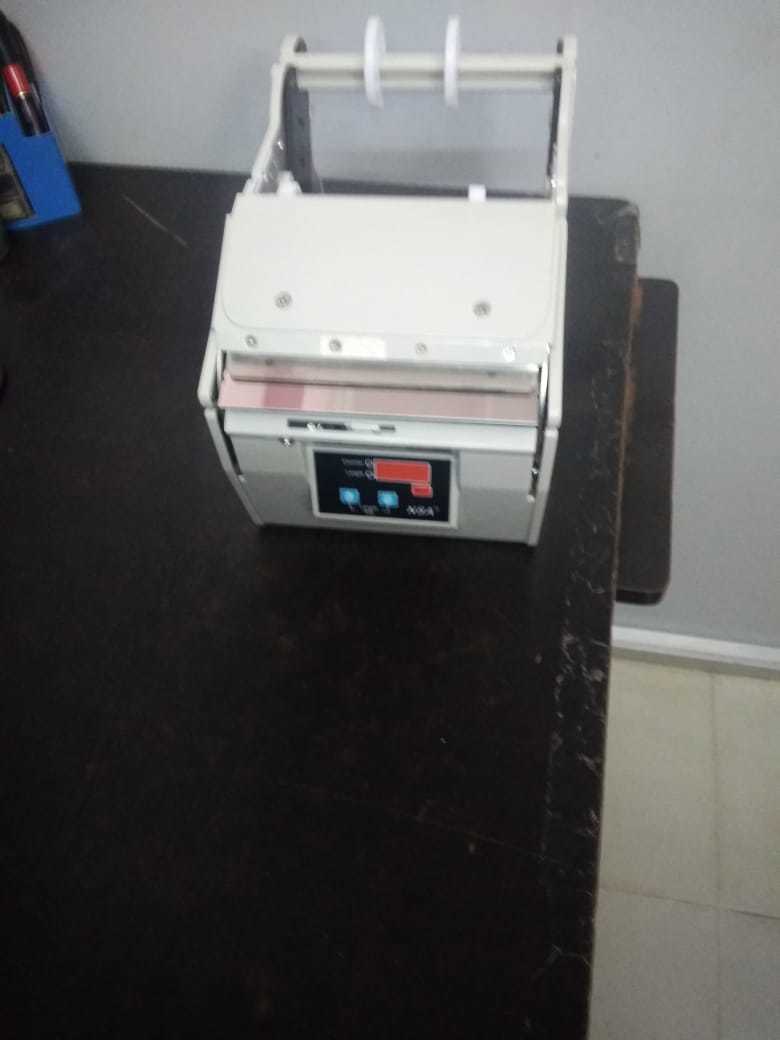 Ken Kou X-130 Automatic Label Dispenser - Color: White