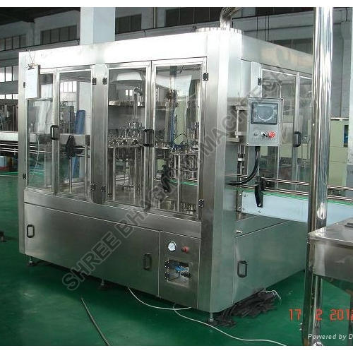 Beverages Filling Machine - 16 To 40 Heads 200 Ml To 2000 Ml Capacity | Stainless Steel Plc Control Automatic Operation 1 Year Warranty No Bottle No Fill Arrangement