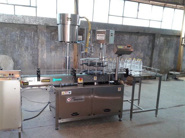 Four Head Bottle Ropp Capping Machine - Automatic Stainless Steel Dimensions: 2135mm X 1120mm X 2250mm 3600-12000 Bottles/hour | Adjustable Height Low Noise Frequency Speed Control