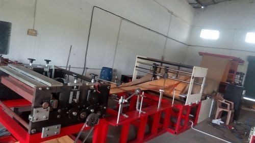 Red And Black Automatic Carry Bag Machine