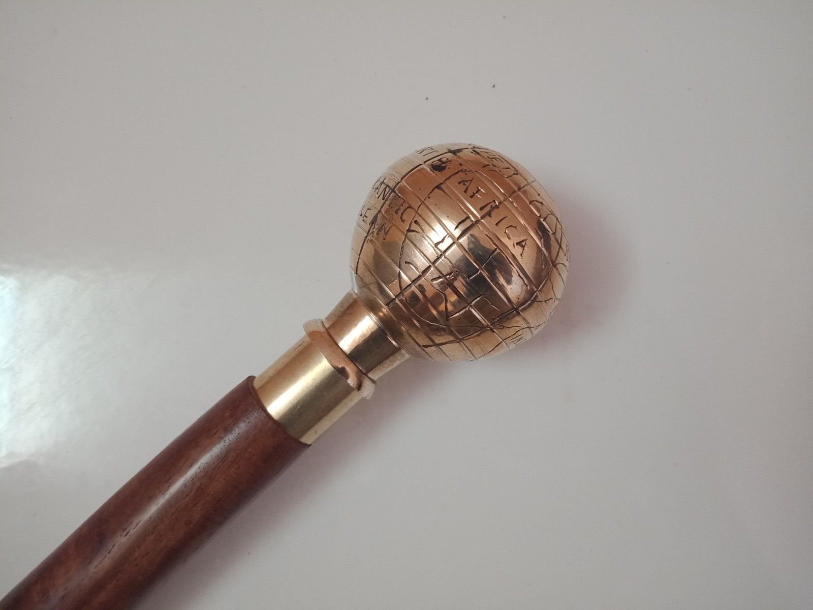 Designer-globe-shape-brass-polish-plated-handle-wooden-3-fold-walking-stick