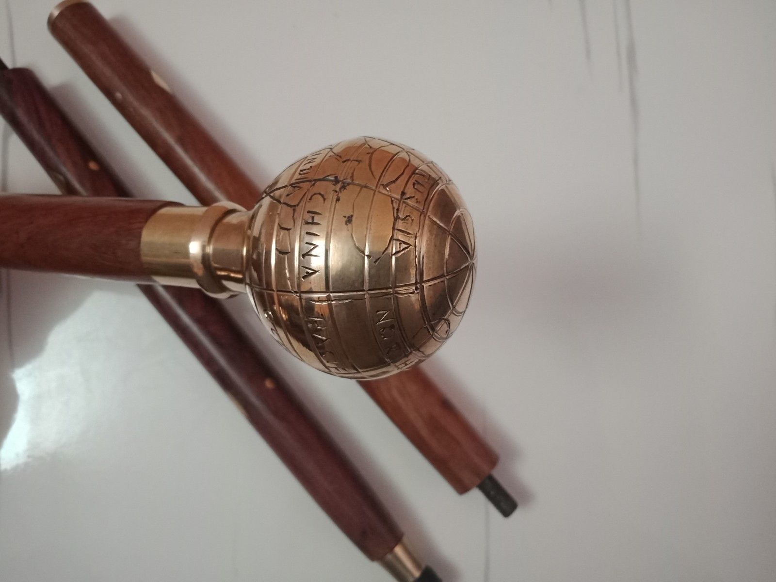 Designer-globe-shape-brass-polish-plated-handle-wooden-3-fold-walking-stick