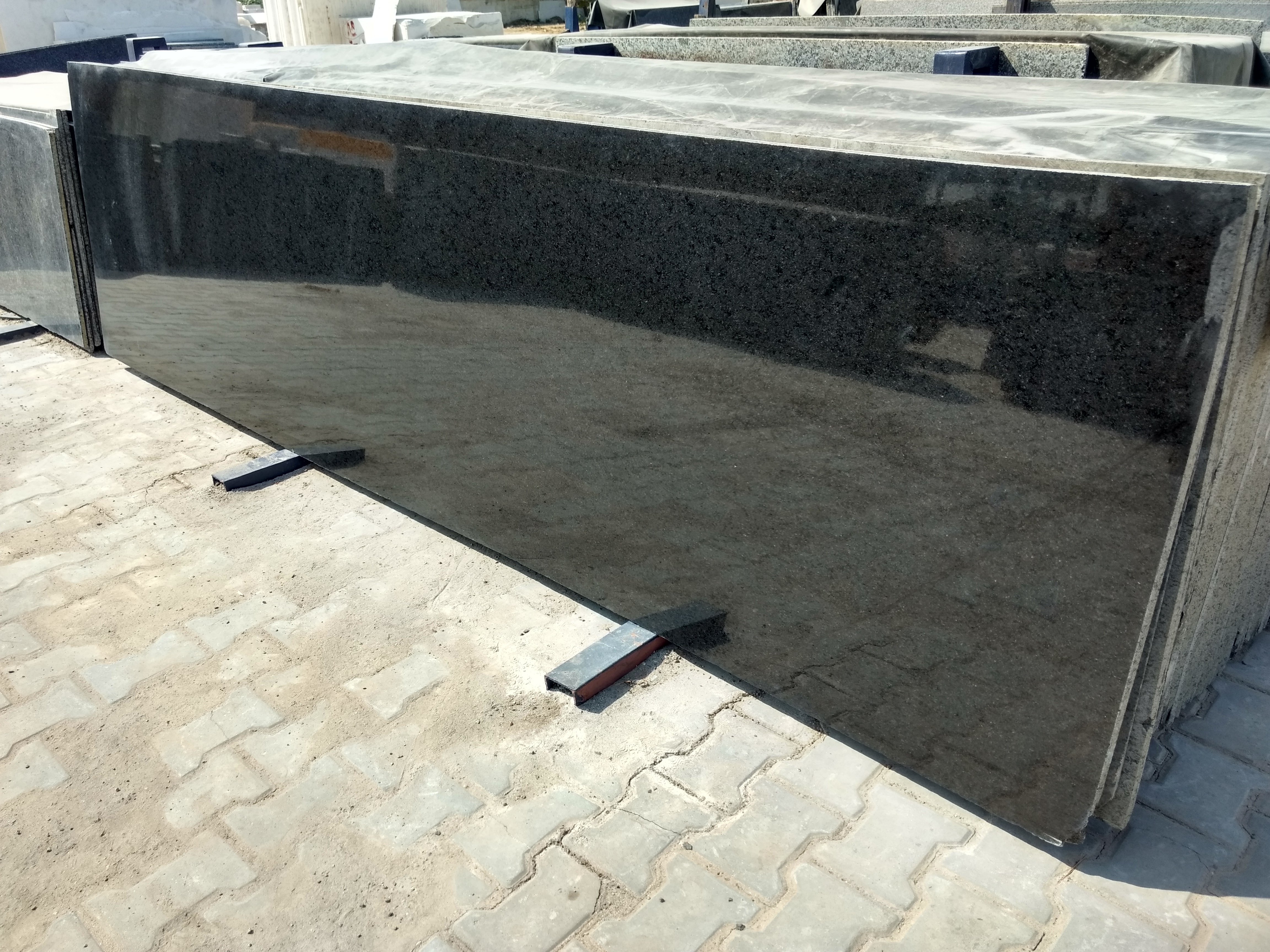 Malkot Black Granite - 102x30x100 Cm, Polished Finish, 17mm Thickness, Luxurious Black Color, Elegant Slab For Countertops And Flooring
