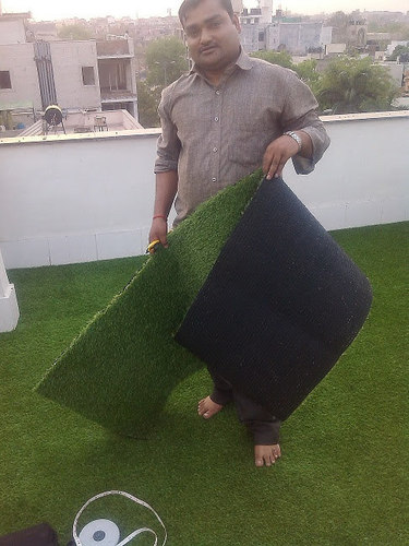 Artificial Grass Carpet - Synthetic Fibers, 15mm Pile Height, 4m Width x 25m Length | 10,000 Stitches per Square Meter, Latex Backing, Drainage Holes