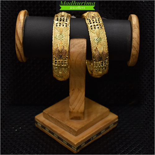 Ladies Artificial Bangle - Grade-A Gold Plated Metal, Classy Design with Detailed Patterns and Skin-Friendly Nature