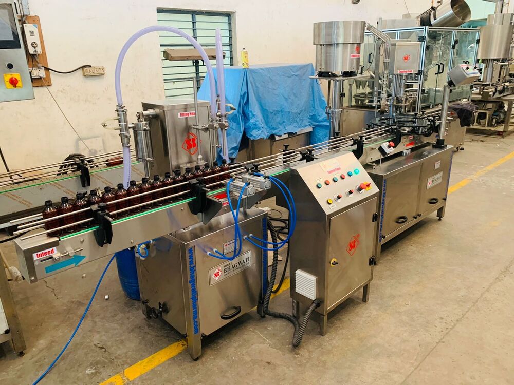 स्वचालित वॉल्यूमेट्रिक टू हेड फिलिंग मशीन की क्षमता: 10 मिली से 1000 मिली