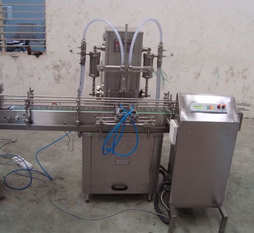 Automatic Volumetric Two He.ad Filling Machine - Material: Stainless Steel