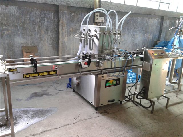 Automatic Volumetric Two He.ad Filling Machine - Material: Stainless Steel