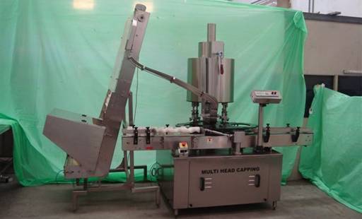 Fully Automatic Four Head Screw Capper Machine With Cap Elevator Capacity: Up To 40 Bpm