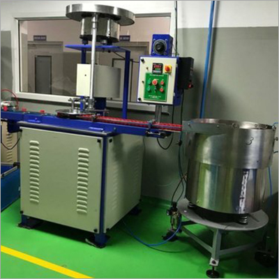 Cap Wadding And Wad Fixing Machine