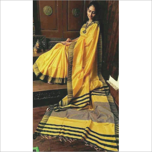 ब्लैक एंड यलो लेडीज़ डिज़ाइनर प्लेन साड़ी