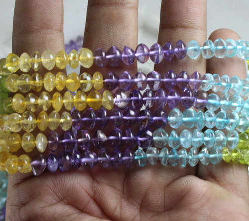 बहु रत्न बटन मोती