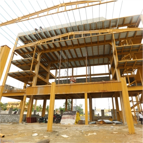 Steel Structures - G+5 Multi Floor Hall With 8.5m Stage Height, Durable Mild Steel, Color Coated Finish, Clear Span Design