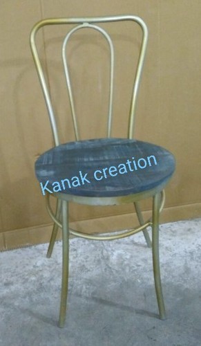 लकड़ी के टॉप के साथ हस्तनिर्मित विशेष टॉलिक्स चेयर।