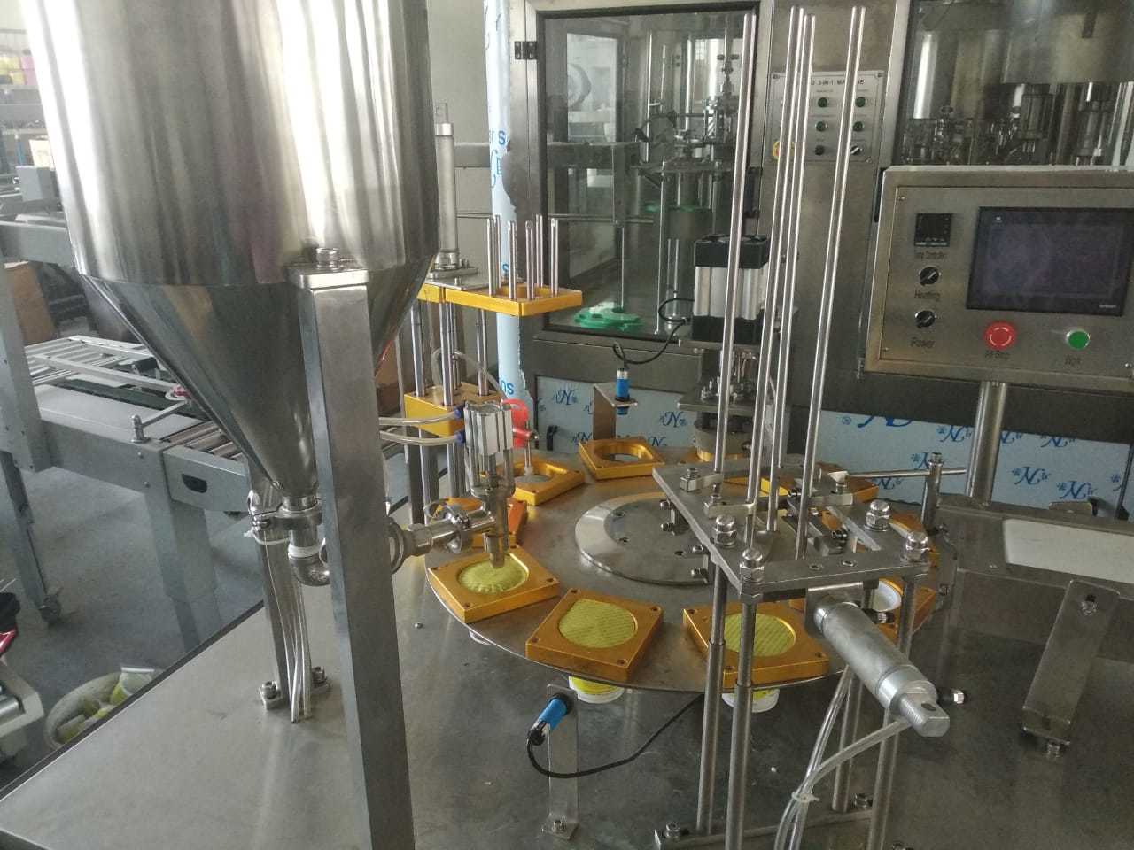 Automatic Cup Filling And Sealing Machine