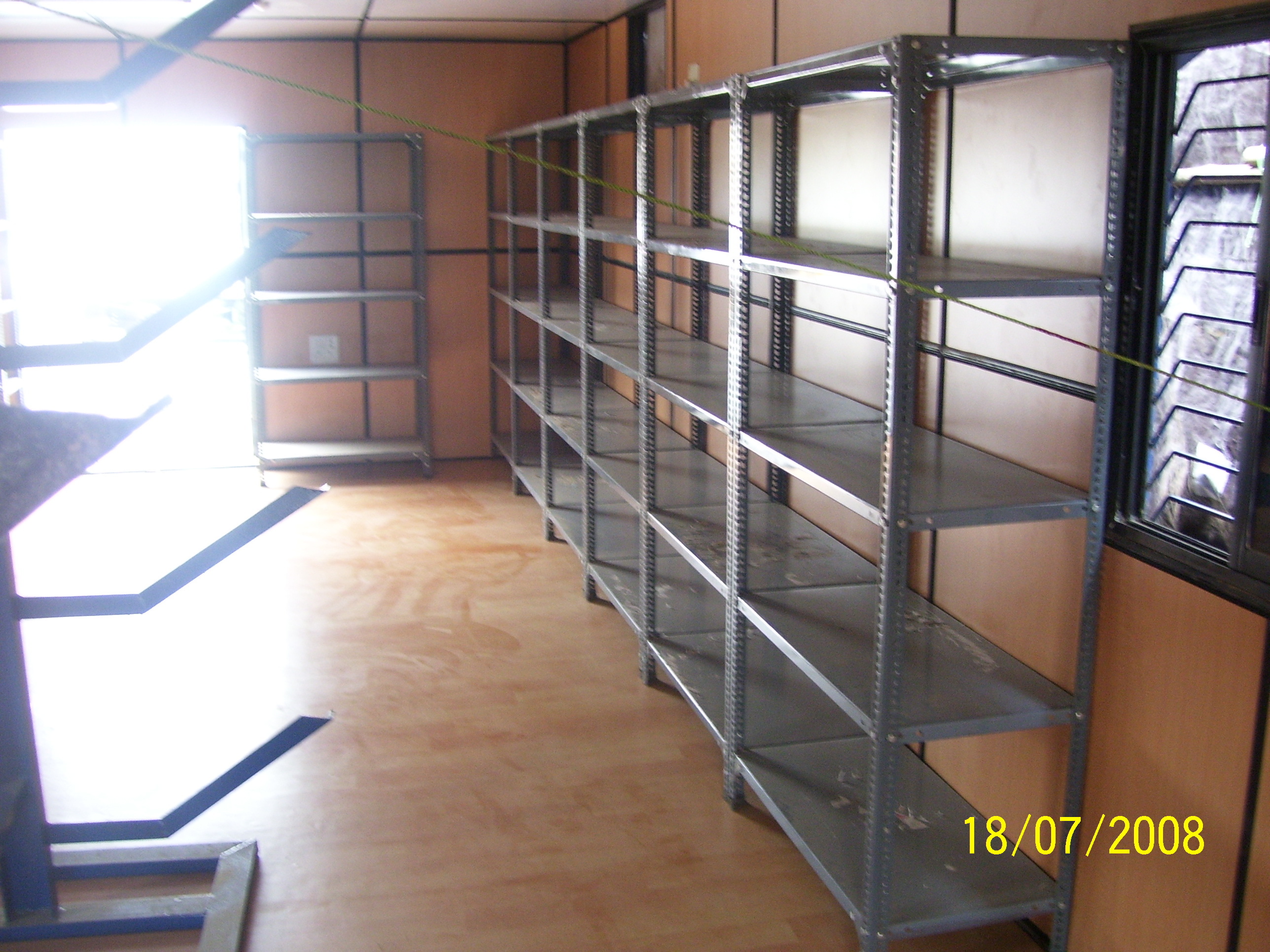 Material Storage Cabin - Steel, Customizable Dimensions , Heavy Duty Shelving Capacity, Insulated Walls, Galvanized Steel Roof, Concrete Floor