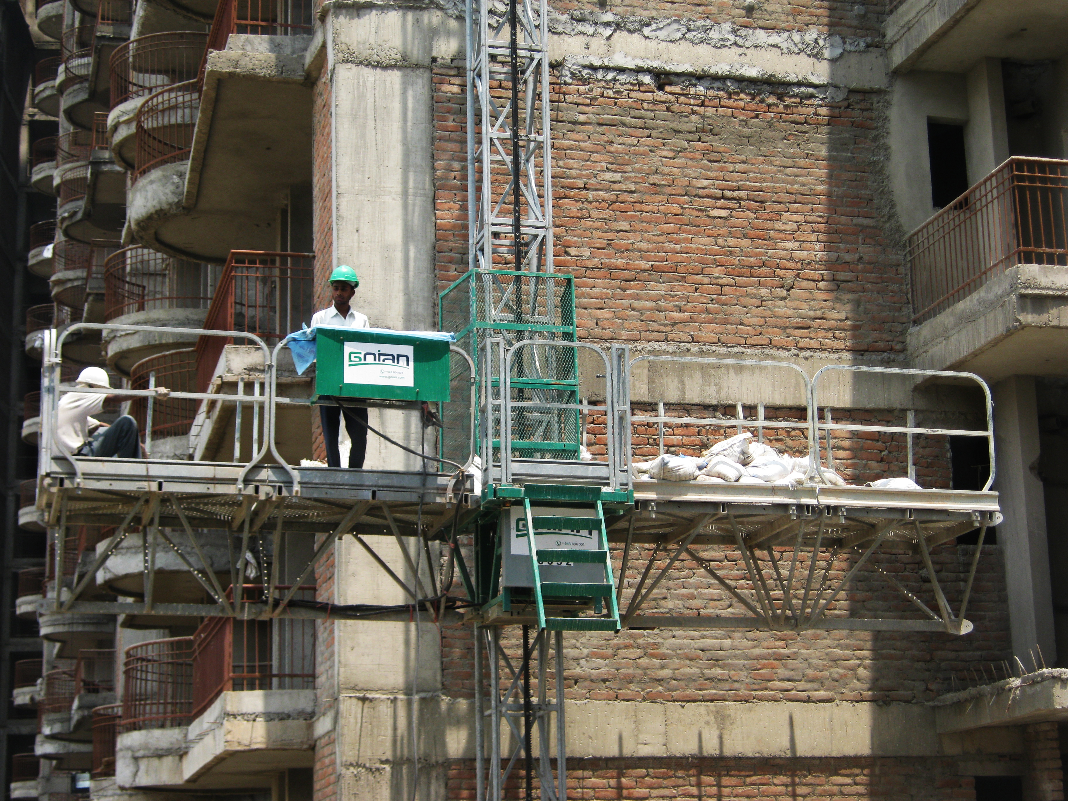 Mcwp Mast Climbing Work Platform Jaso-goin - Steel, Height 400 Meters, Gray Color | 5000 Kg Capacity, Hydraulic Pressure Lift, Plc Control System, Automatic Operation, 1 Year Warranty