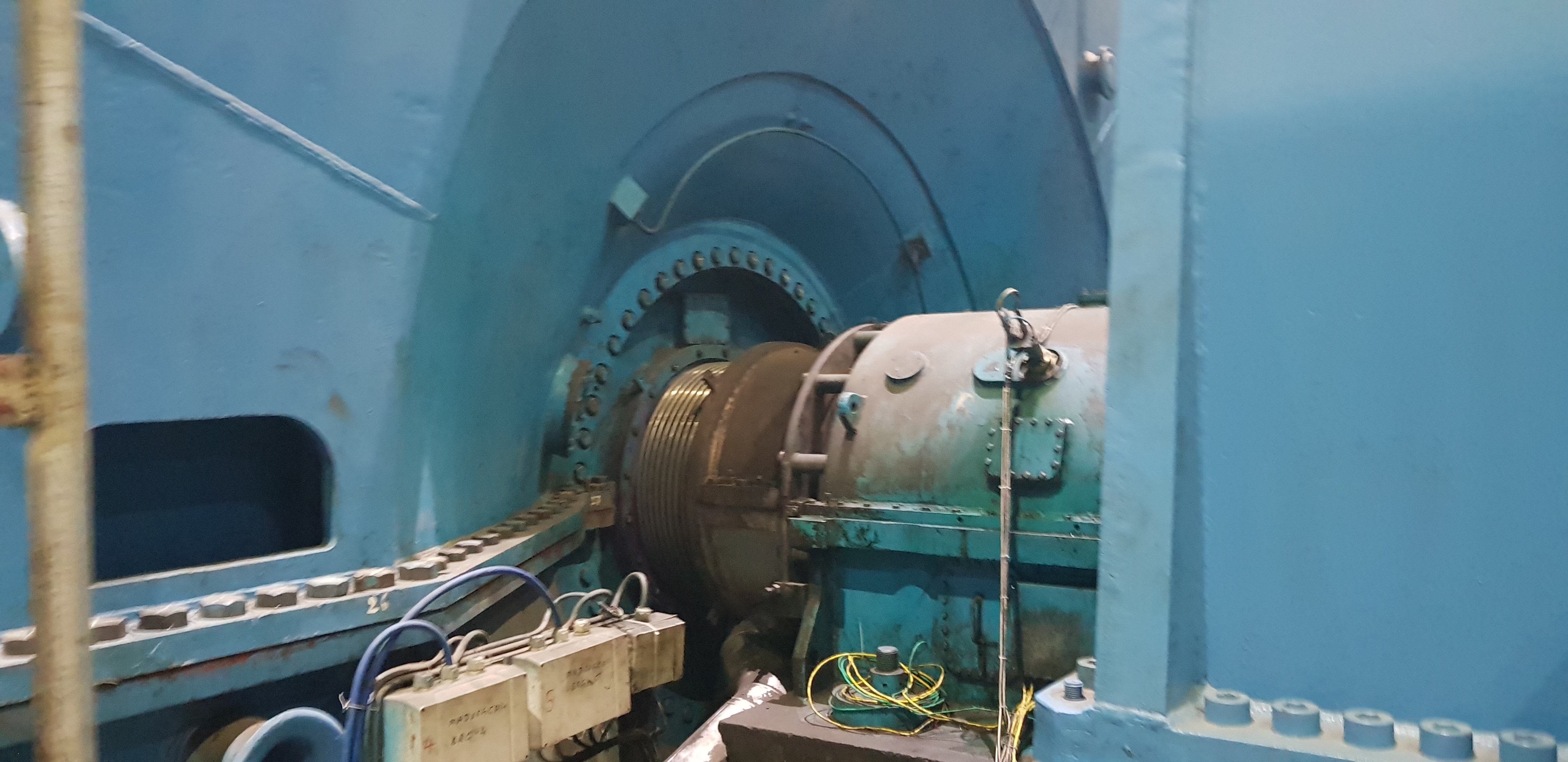 Online Condenser Helium Leak Testing