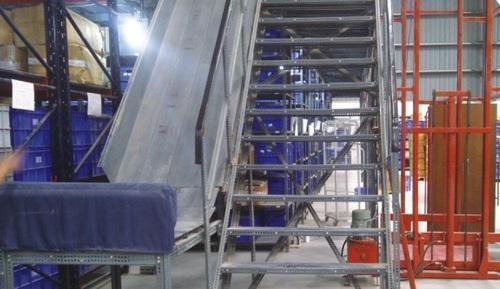 Grey And Red Mezzanine Floor With Staircase