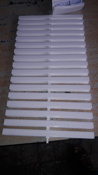 Blue And White Pool Overflow Grating