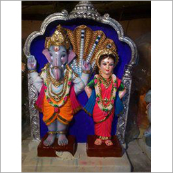 Painting Clay Laxmi Ganesh Statue