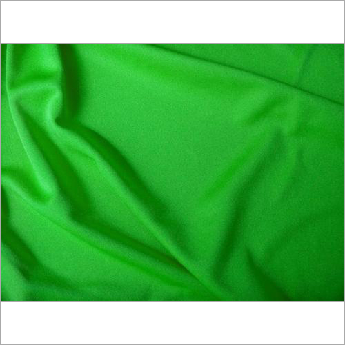 Green Plain Polyester Interlock Fabrics - Polyester Material, Moderate Stretch, Solid Green Color , Smooth Texture for Commercial Use