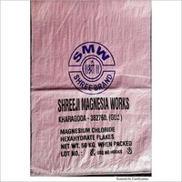 Magnesium Chloride Hexahydrate Flakes - 50 kg Bag Packing | White Colorless, 100% Purity, Water-Soluble, De-Icing Application, Irregular Shape