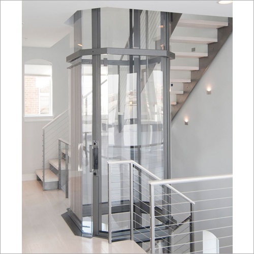 Residential Glass Elevator - Glass and Steel, Customizable Dimensions, 1000 kg Capacity | 220V Power Supply, 0.6 m/s Speed, 50 dB Noise Level, Emergency Stop Button, Over-speed Protection