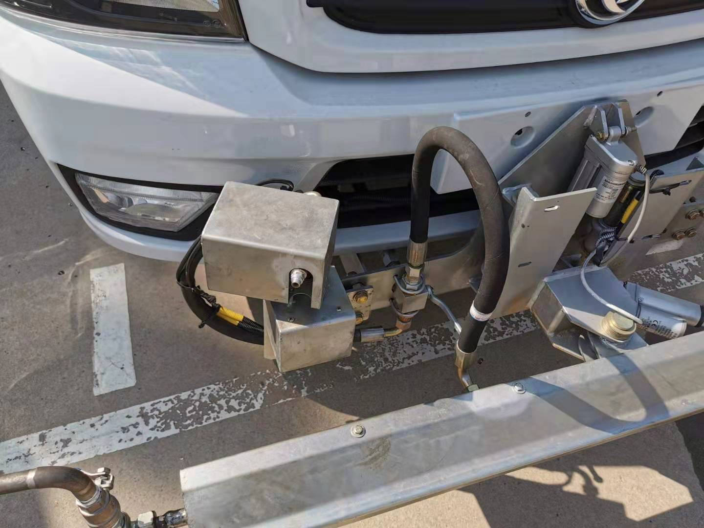 The Cleaning Of Pavement And Flyer Road Maintenance Vehicle