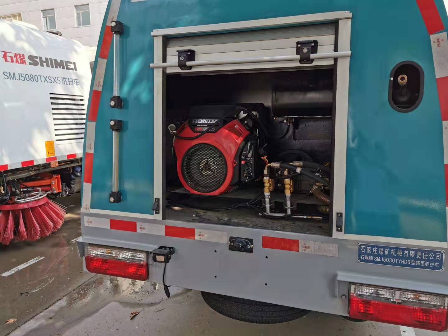 The Cleaning Of Pavement And Flyer Road Maintenance Vehicle