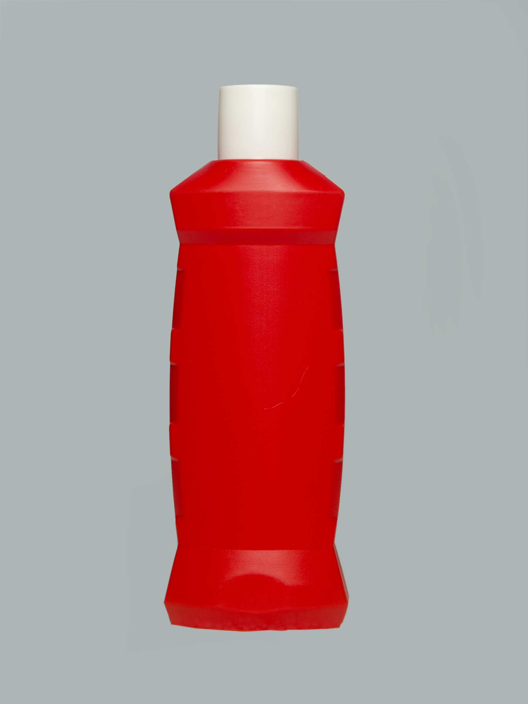 Red Empty Bathroom Cleaner Bottle
