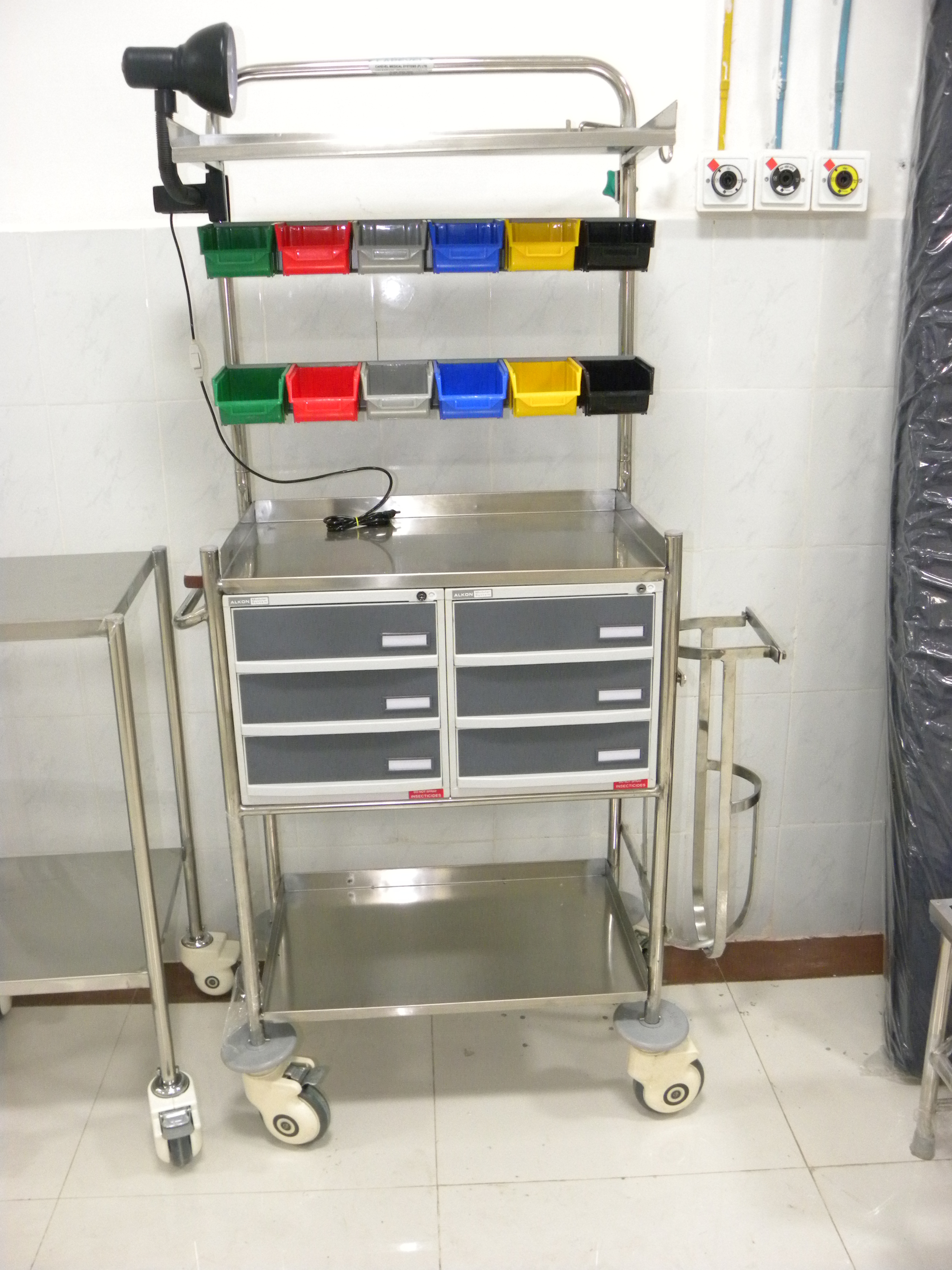 Crash Cart - Stainless Steel, 940mm L X 490mm W X 1535mm H, Six Coloured Bins, Lockable Storage Units With Drawers, Four Swivel Castors, Cardiac Massage Board