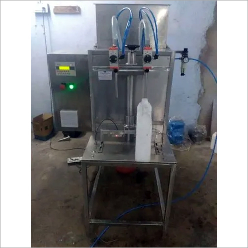 TWO HEAD SEMI AUTOMATIC VISCOUS FILLING MACHINE