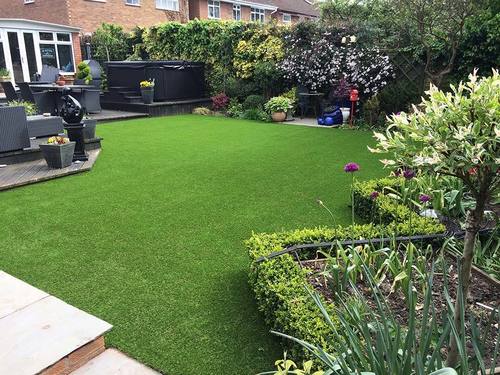 Artificial Grass - Synthetic Fibers, 1.5 Inches Pile Height, Green Color | 12,000 Stitches Per Square Meter, 10 Years Warranty, Perforated Backing