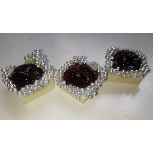Handmade Flavoured Chocolate - Fine Chocolate Cups, Customized Pack Size, Brown Color, 1 Year Shelf Life, Store In Cool & Dry Place