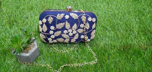 Ladies Clutch - Raw Silk, 6.5 cm Length, 17 cm Width, 4 Inches Height | Blue with Floral Embroidery, Chain Strap, Gold Tone Detailing
