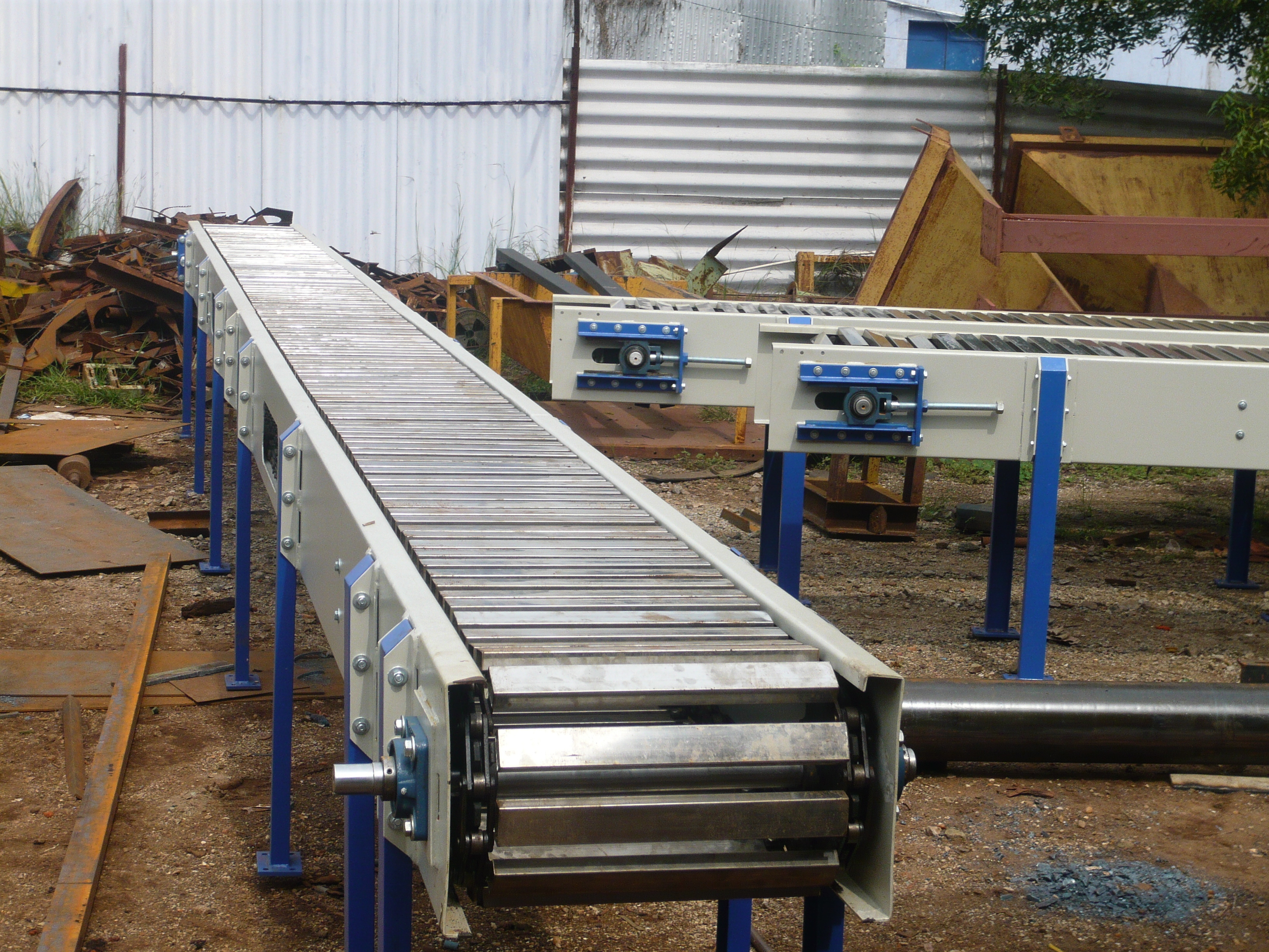 Slat Conveyor - Heavy Duty Ms & Ss Material, Customized Sizes & Lengths, Load Capacity Up To 1000 Kg, Easy To Install , Longer Production Life