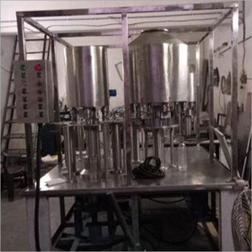 भरने और कैपिंग मशीन को धोना