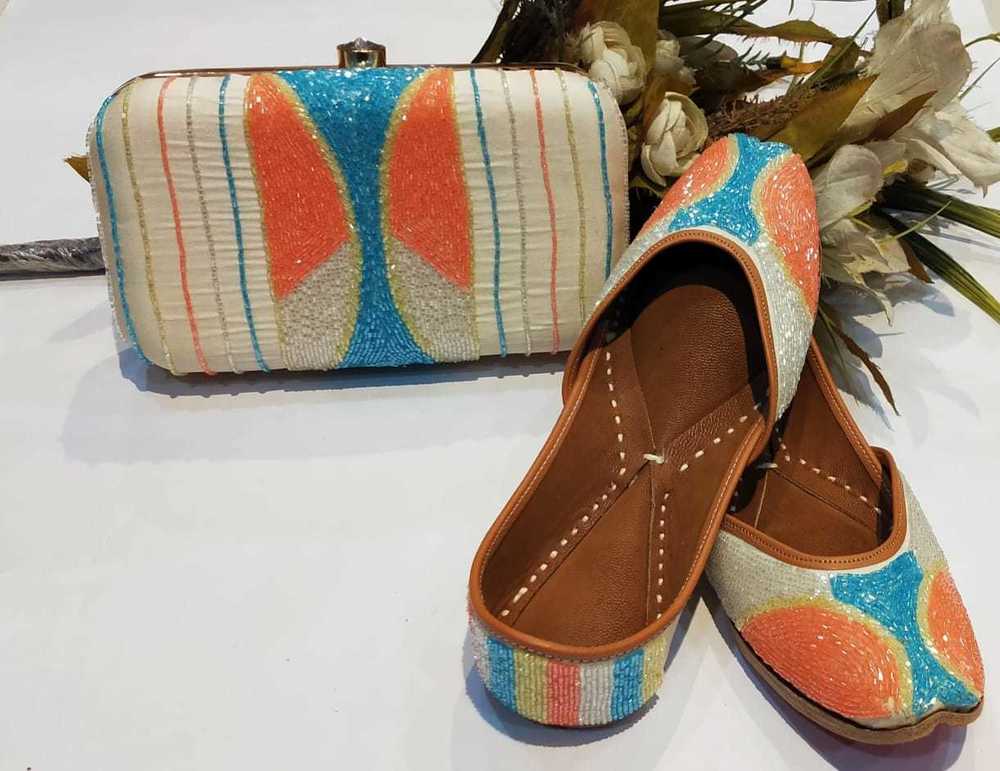 Washable Multi Color Punjabi Jutti With Pearl Work With Maching Clutch