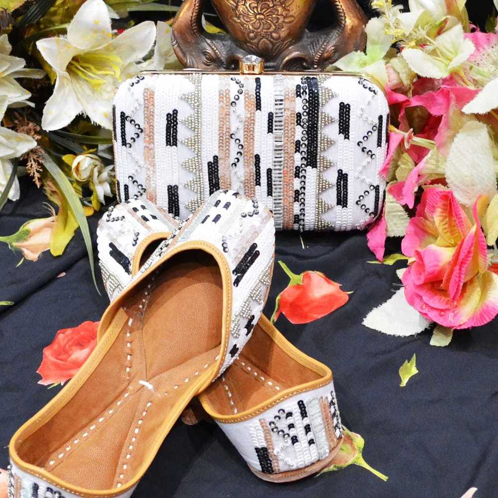 White Party Wear  Punjabi Jutti With Multi Preal Work With Maching Clutch