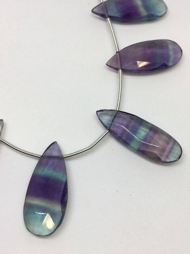 Natural Multi Fluorite Smooth Pear Shaped Beads - 10x25-10x30mm Strand Of 11 Pieces | Grade A, Natural Stone, Pear Cut