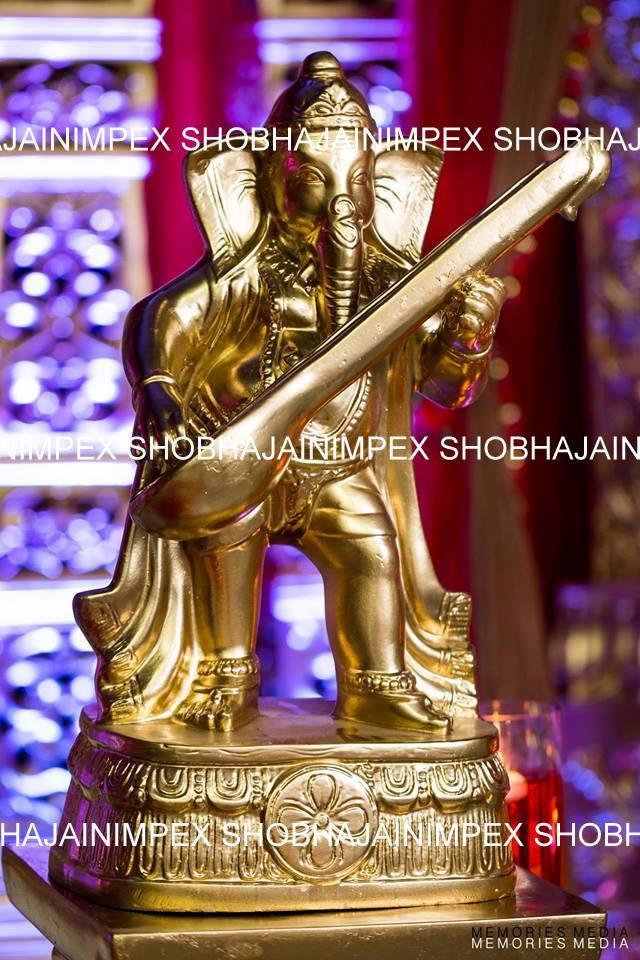 Golden Ganesh Ji Aisle Statues