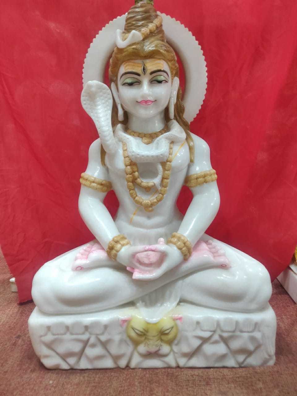 Mahadev Statue - White Marble, 1.5 Foot Size | Elegant Sitting Design, 4 Hands Holding Damru, Trishool, And Kamandal, Adorned With Cloth And Jewellery For Temples And Home Decoration
